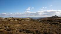 Exploring the vast and rugged countryside of Dartmoor National Park is a must.