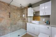 The family shower-room has oodles of space.