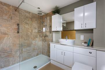 The family shower-room has oodles of space.