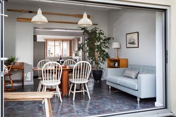 The kitchen/diner has bi-fold doors which lead onto the outside terrace, the perfect place for morning coffee or an evening aperitif.