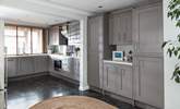 The open plan kitchen/diner is flooded with light.  - Thumbnail Image