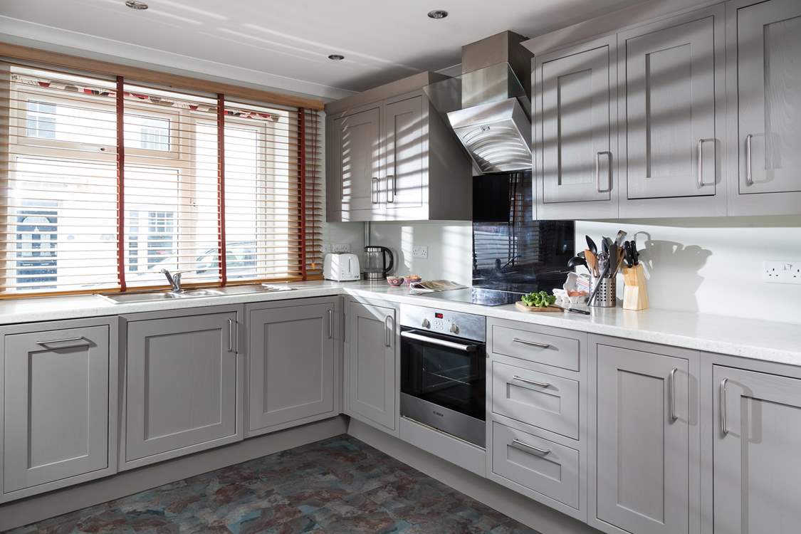 The super sleek kitchen has everything you will need to create a holiday feast.