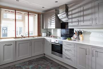 The super sleek kitchen has everything you will need to create a holiday feast.