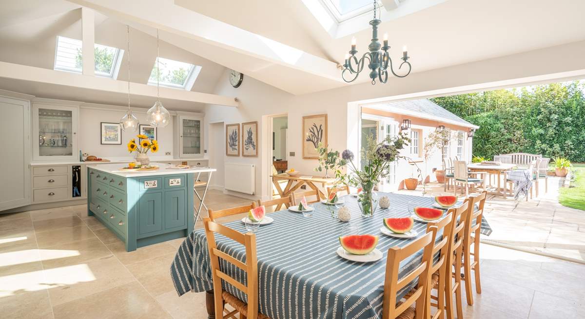 The luxurious kitchen/dining-room showcases plenty of light and space. 