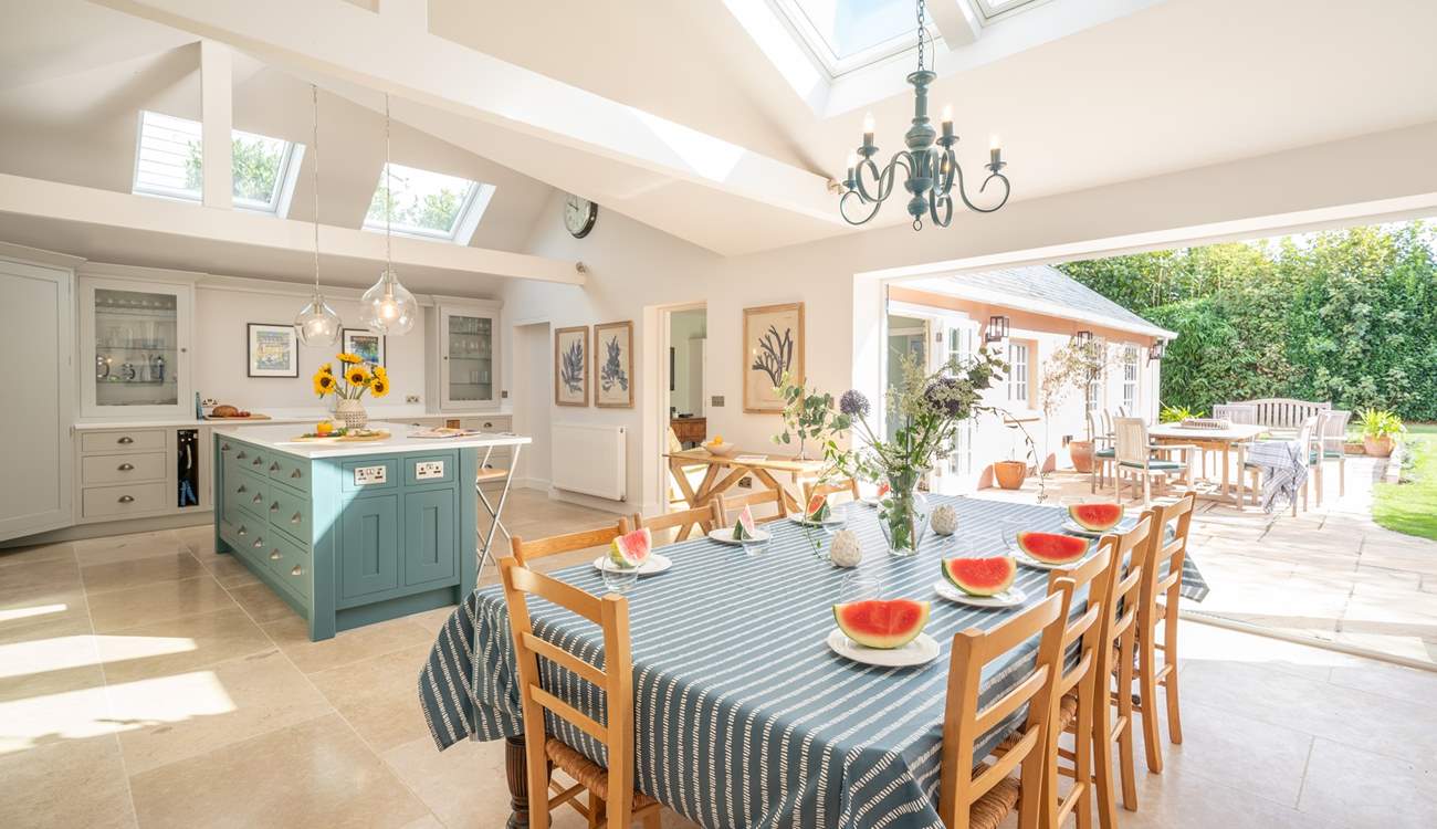 The luxurious kitchen/dining-room showcases plenty of light and space. 