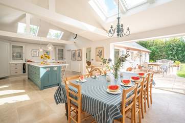 The luxurious kitchen/dining-room showcases plenty of light and space.