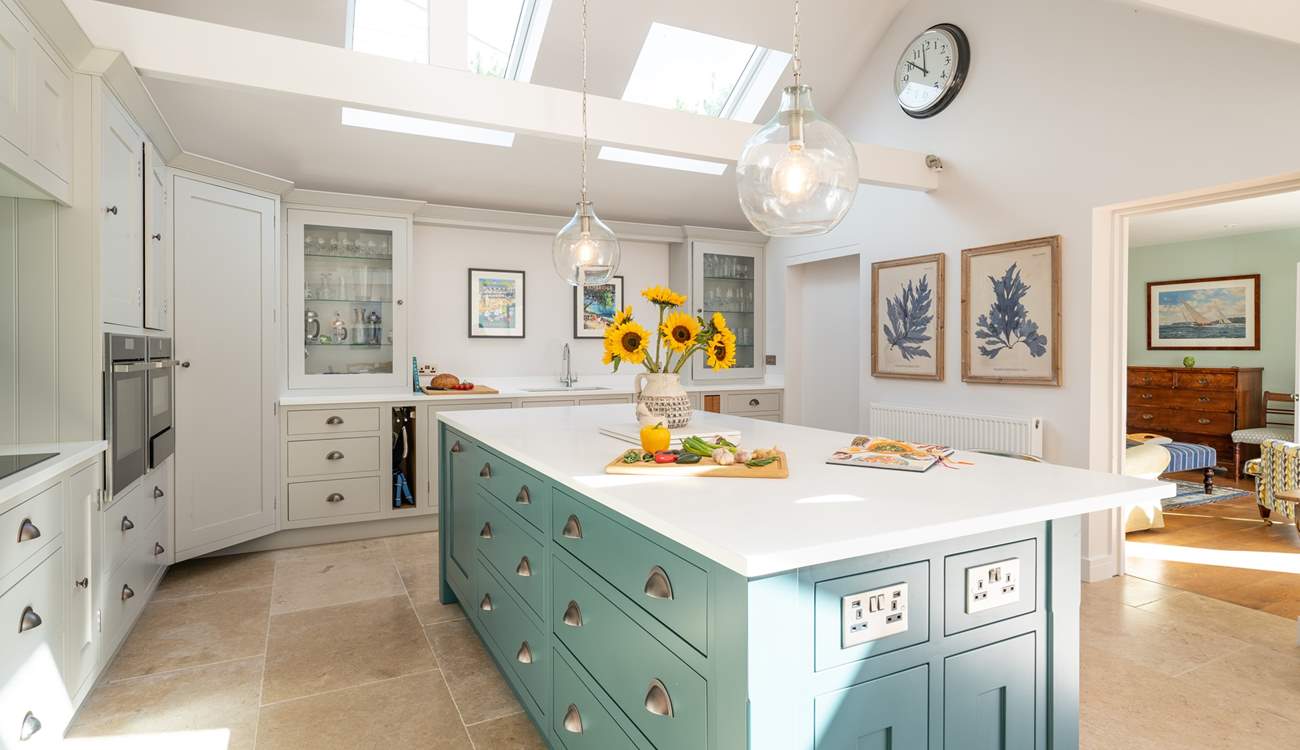 The divine modern kitchen is an ideal place to cook up a treat.