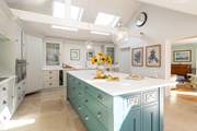 The divine modern kitchen is an ideal place to cook up a treat.