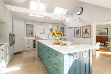 The divine modern kitchen is an ideal place to cook up a treat.