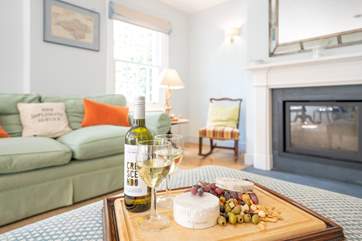 Wine and dine with the fire crackling in the background.
