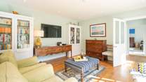 The second sitting-room on the ground floor with doors opening onto the patio-area. 