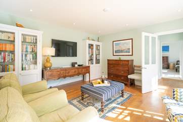 The second sitting-room on the ground floor with doors opening onto the patio area.