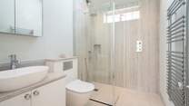 The ground floor shower-room situated between the main bedroom and second sitting-room. 