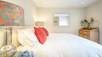 The second bedroom offering a 'zip and link' bed for flexibility...
