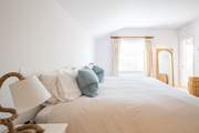 The fourth bedroom on the first floor can be made up as a double or twin with views across the garden...
