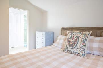 The fifth bedroom located on the first floor overlooks the front of the property...