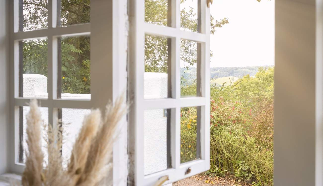 Open the windows and let the light flow through.