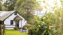 Pretty glimpses of Devon's gorgeous countryside surround this humble abode. 