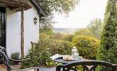 Take a seat on the patio, breathe in the fresh country air and enjoy the peaceful surroundings. - Thumbnail Image