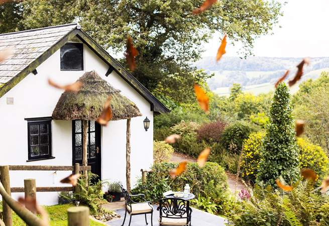 Pretty glimpses of Devon's gorgeous countryside surround this humble abode. 