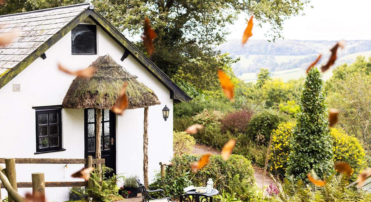 Pretty glimpses of Devon's gorgeous countryside surround this humble abode. 