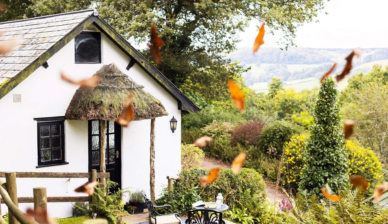 Pretty glimpses of Devon's gorgeous countryside surround this humble abode. 