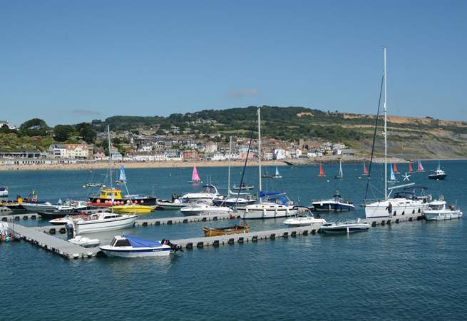 Lyme Regis has plenty to keep you busy all day; fossil and dinosaur museums, some great shops, fishing trips, good food or simply laze on the beach.