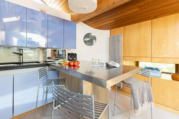 The kitchen offers a great space to whip up and serve a feast for two.