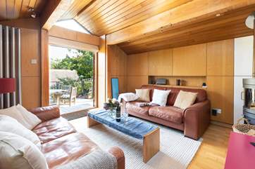 The living area complete with wood-burner offers oodles of space, whilst opening up onto your raised deck area.