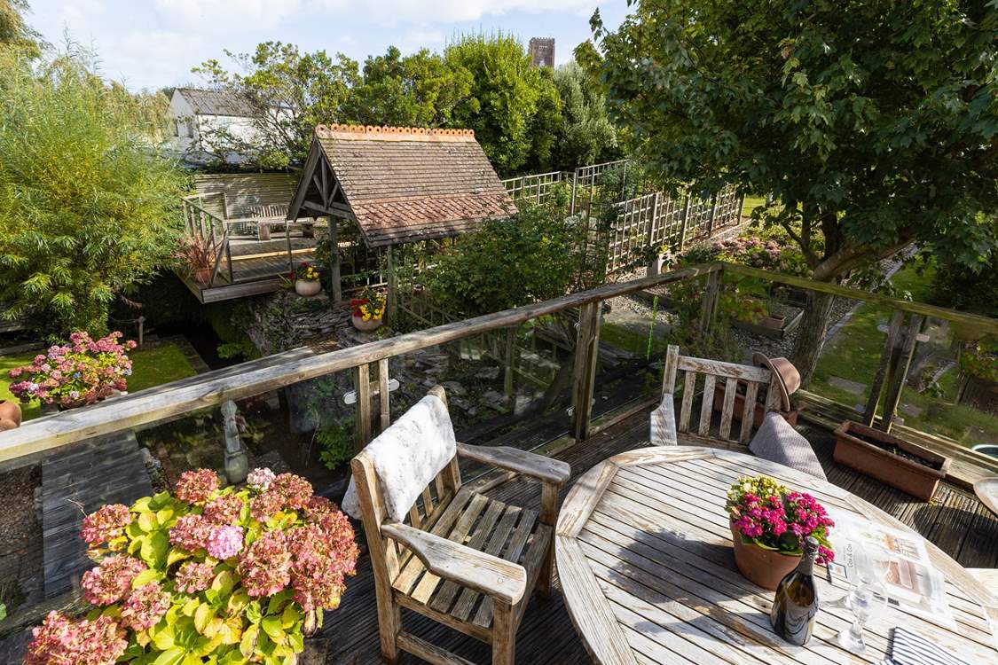What a great vantage point overlooking the lower and upper garden, along with the trickling stream.