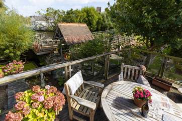 What a great vantage point overlooking the lower and upper garden, along with the trickling stream.