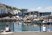 Several eateries and welcoming bars are littered around the harbour bowl.
