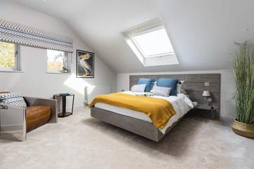 Bedroom three is home to this superb king-size bed.