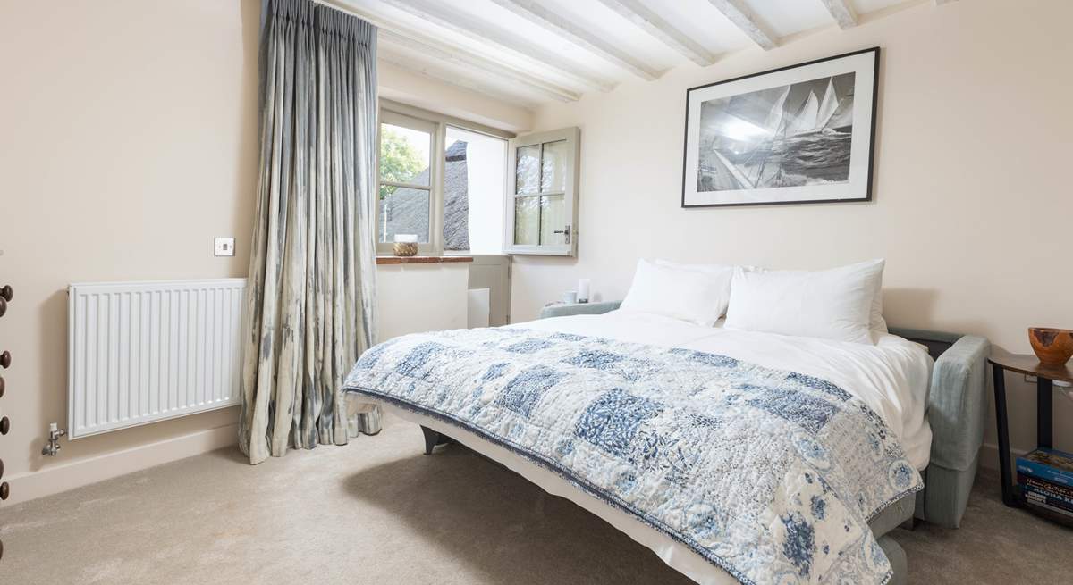 Bedroom one is on the ground floor and offers direct access to the outside decked area via the stable-door.