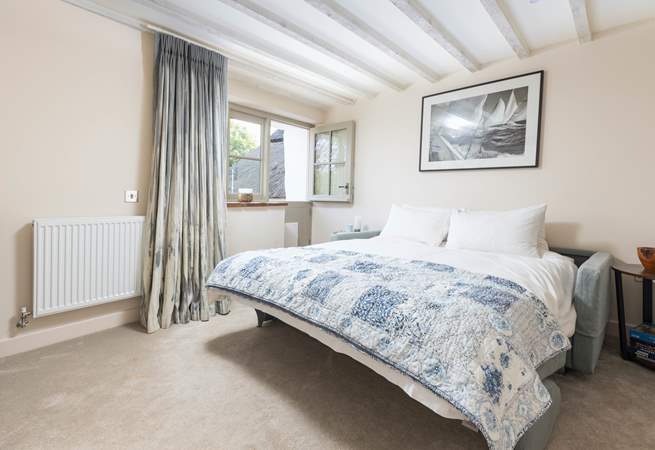 Bedroom one is on the ground floor and offers direct access to the outside decked area via the stable-door.