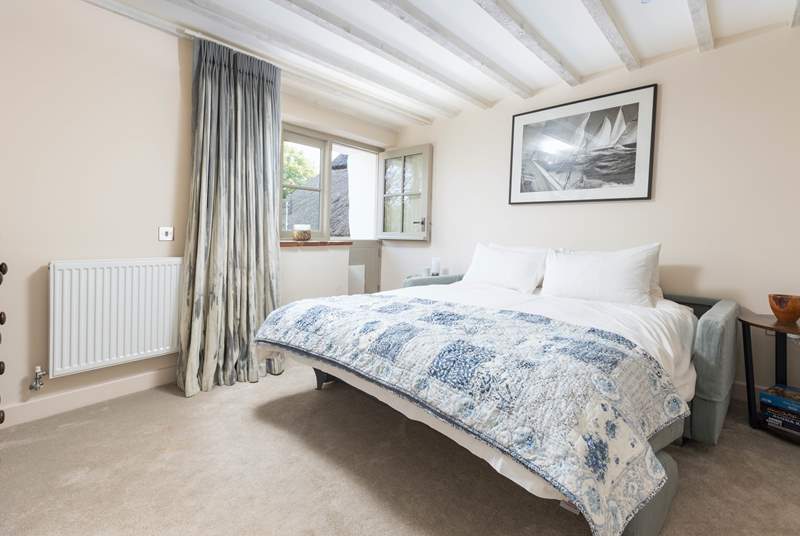 Bedroom one is on the ground floor and offers direct access to the outside decked area via the stable-door.