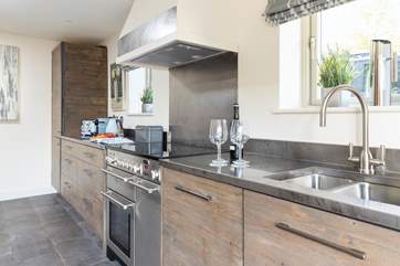 The kitchen is beautifully designed and fully equipped with everything you will need to whip up a holiday feast.