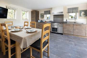 Feasting together is such a pleasure in this glorious kitchen/dining area.
