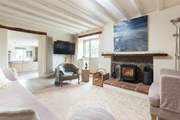 The living area is a super comfy space to relax and unwind in after a full day of adventure and activity. Especially as the wood burner is there to greet you on those chillier evenings.
