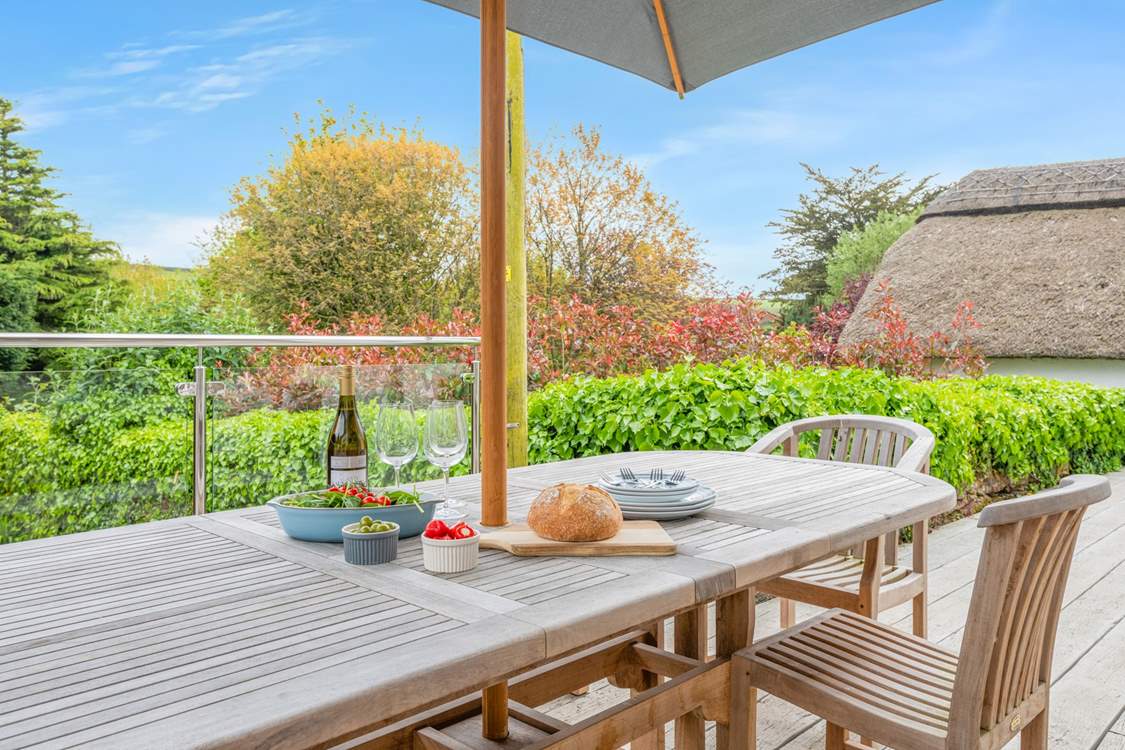 The gorgeous outside space is perfect for enjoying barbecue dinners and drinks.