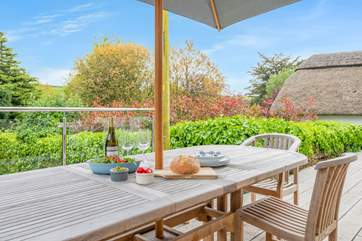 The gorgeous outside space is perfect for enjoying barbecue dinners and drinks.