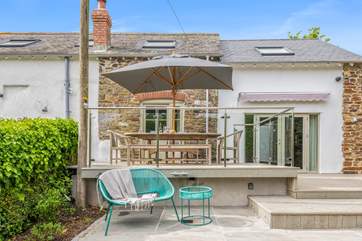 This area is a fabulous sun-trap, which is why it is fully equipped with a huge sunshade for those who wish to escape the sun, yet still enjoy this beautiful outside space.