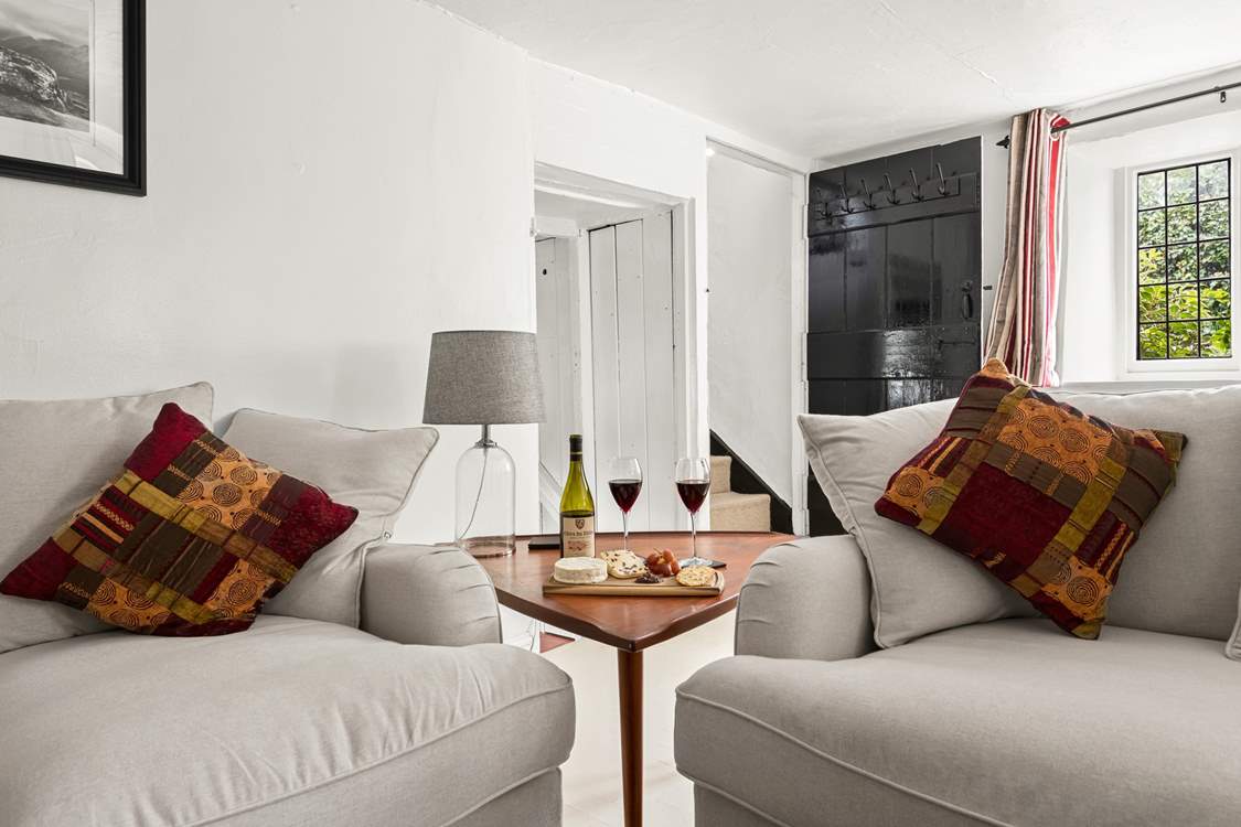 Super comfy sofas, good luck moving from them. The stairs to the first floor bedroom and bathroom also lead from the sitting/dining-room.