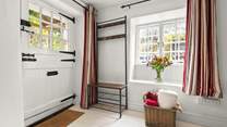 Step into the cottage and into this charming reception area.