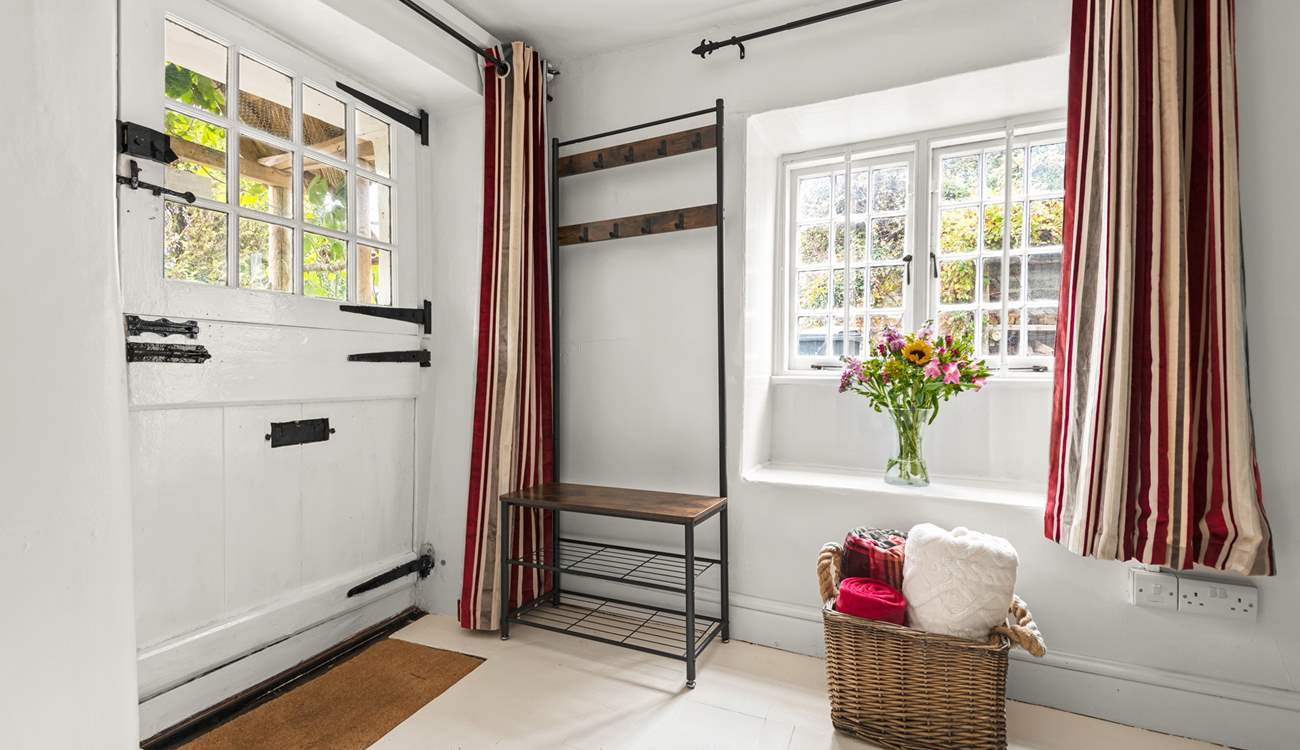 Step into the cottage and into this charming reception area.