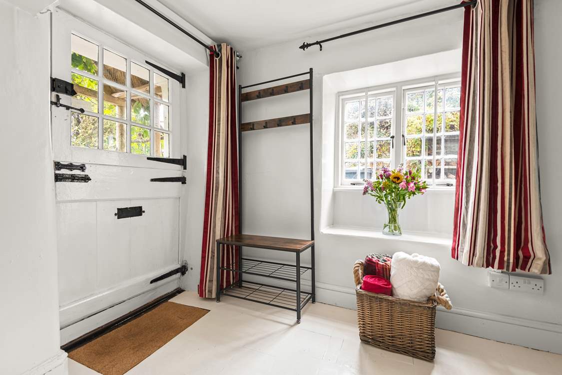 Step into the cottage and into this charming reception area.