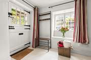 Step into the cottage and into this charming reception area.