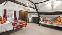 Due to the size of the bedroom, this fabulous cottage can accept a third guest as the daybed turns into a comfy single bed. 