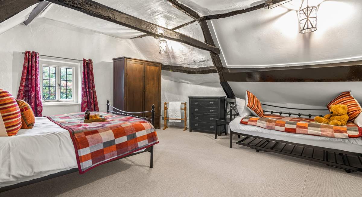 Due to the size of the bedroom, this fabulous cottage can accept a third guest as the daybed turns into a comfy single bed. 