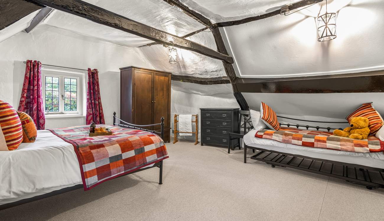 Due to the size of the bedroom, this fabulous cottage can accept a third guest as the daybed turns into a comfy single bed. 